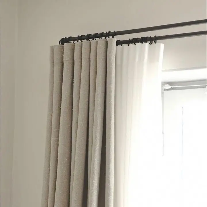 15. Hang Curtains Higher to Create Height