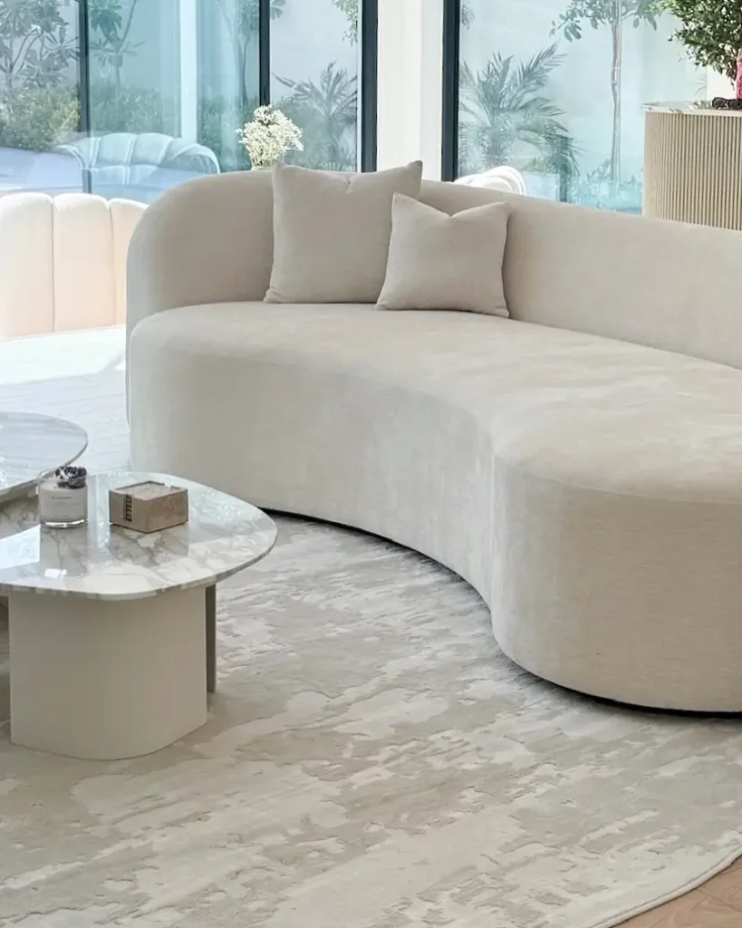 2. Curved & Organic Sofa Shapes (Modern Sofa Designs 2026)