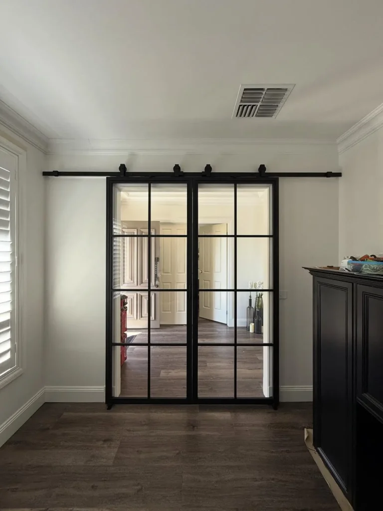 4. Sliding Barn Doors That Save Space and Add Character