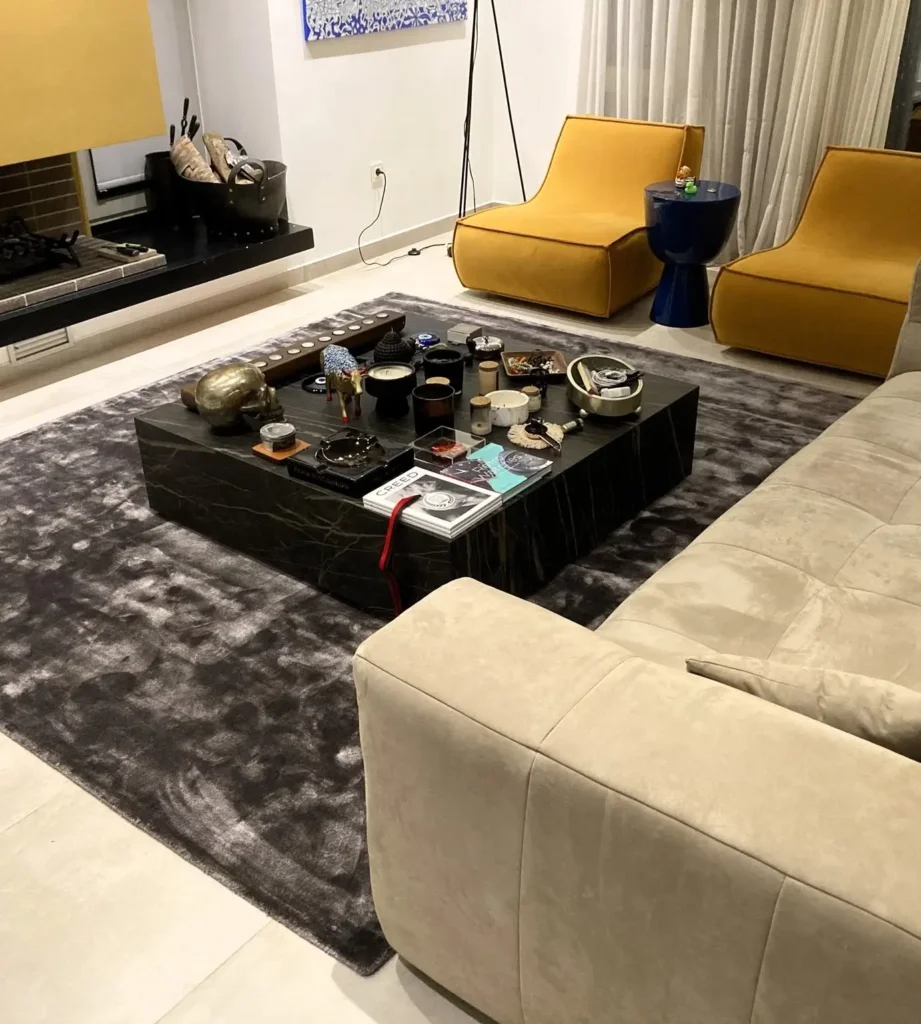 6. Add a Dark Area Rug to Anchor the Room