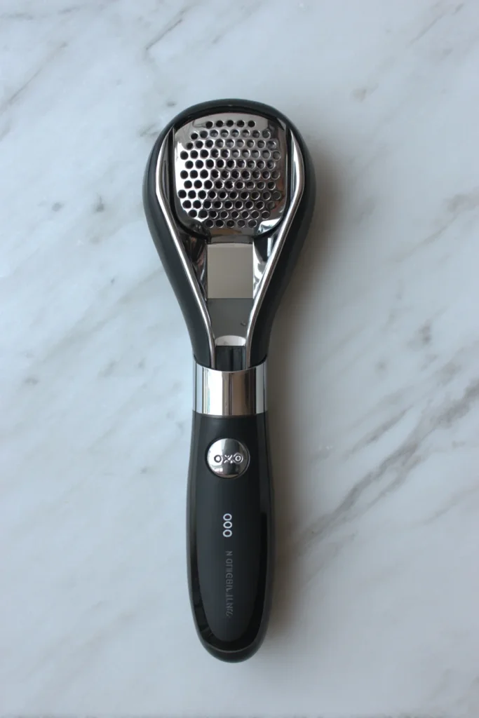 1. OXO Good Grips Garlic Press – No More Sticky Fingers