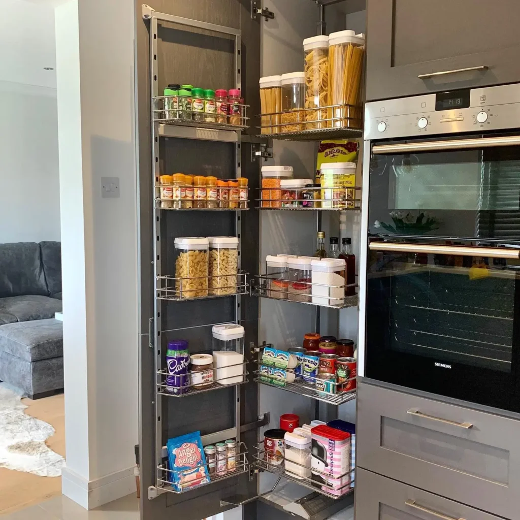 14. Put a Narrow Shelf Unit Next to the Fridge or Outside the Kitchen