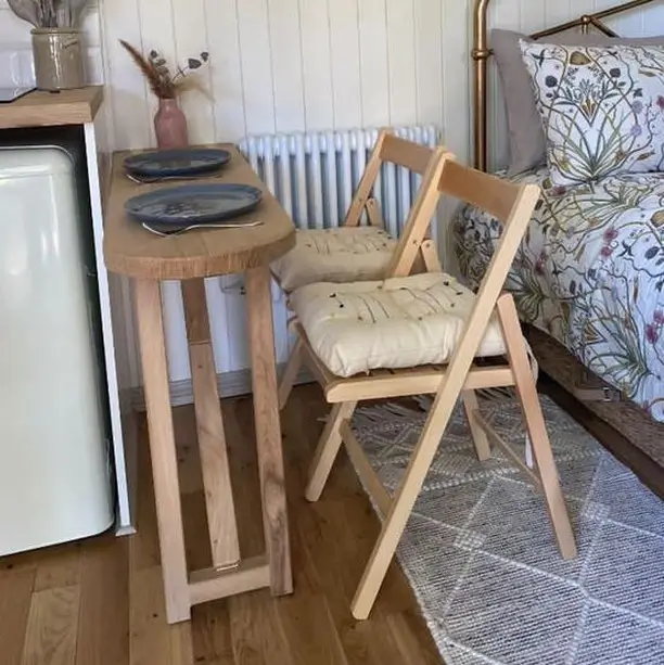 17. Use a Fold Down Table Instead of a Fixed Dining Surface