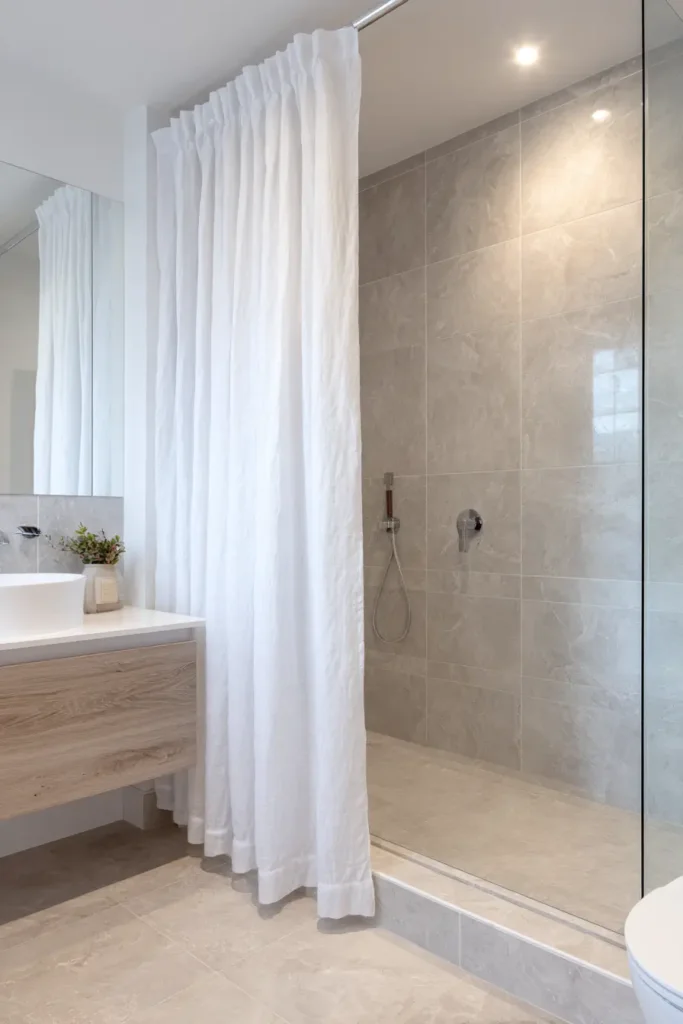 7. Shower Curtain or Glass Change